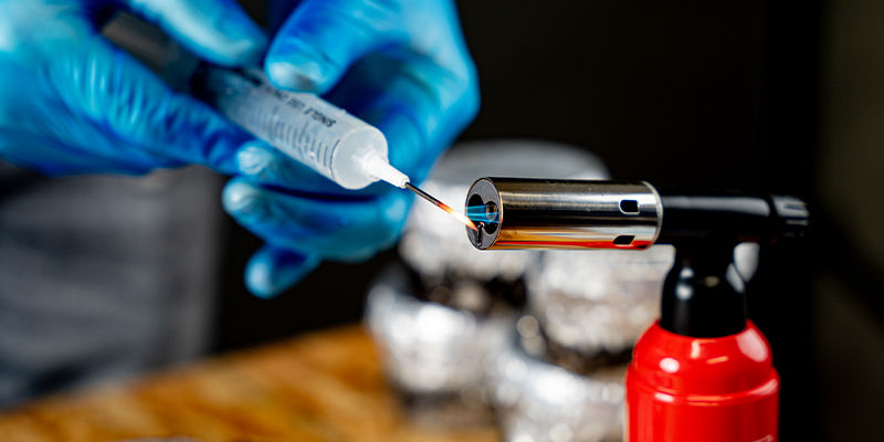 PF tek sterilise the needle with a flame until it&rsquo;s red hot